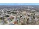 An aerial view shows this lovely home's location within a quiet suburban neighborhood with mature trees at 12404 Doe Ln, Indianapolis, IN 46236