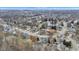 Expansive aerial view of a residential neighborhood showcasing well-maintained homes and tree-lined streets at 12404 Doe Ln, Indianapolis, IN 46236