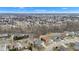 This aerial view showcases the home's location within a quiet suburban neighborhood with mature trees at 12404 Doe Ln, Indianapolis, IN 46236