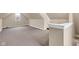 Finished attic area with neutral carpet, natural light and ample space to utilize as needed at 12404 Doe Ln, Indianapolis, IN 46236