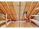 Exposed beams in the attic space, showing insulation and duct work at 12404 Doe Ln, Indianapolis, IN 46236