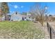 Well manicured, fenced backyard with grass and new patio at 12404 Doe Ln, Indianapolis, IN 46236