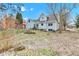 Large grassy backyard behind a beautiful two-story home at 12404 Doe Ln, Indianapolis, IN 46236