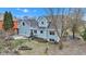The backyard provides seclusion, with fencing and natural elements adding to the overall serene setting at 12404 Doe Ln, Indianapolis, IN 46236