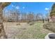 A view of the unfenced backyard of the property at 12404 Doe Ln, Indianapolis, IN 46236