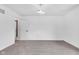 Bedroom featuring neutral carpet, overhead light fixture, and doorway into another room at 12404 Doe Ln, Indianapolis, IN 46236