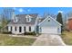 Charming two-story home with attached garage and dormer windows at 12404 Doe Ln, Indianapolis, IN 46236
