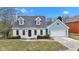 Beautiful two-story home with dormer windows and attached garage at 12404 Doe Ln, Indianapolis, IN 46236