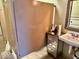 Practical bathroom stalls feature tile floors, clean lines, and convenient vanity area for guests at 1300 W University Ave, Muncie, IN 47303