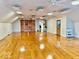Spacious bonus room with wood floors, multiple closets, and ample natural light at 1300 W University Ave, Muncie, IN 47303