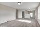 Upper-level bonus room with natural light and neutral walls at 13115 N Departure W Blvd, Camby, IN 46113