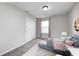 Cozy bedroom features a large closet, soft carpet, and a bright window with soft light at 13115 N Departure W Blvd, Camby, IN 46113