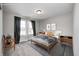 Inviting bedroom with a comfortable bed, modern decor, and a large window to bring in natural light at 13115 N Departure W Blvd, Camby, IN 46113