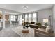 Spacious living room with natural light, dining area and modern design elements at 13115 N Departure W Blvd, Camby, IN 46113