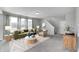 Cozy living room featuring modern decor, a comfortable sofa, and abundant natural light at 13115 N Departure W Blvd, Camby, IN 46113