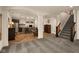 This spacious finished basement features a staircase, a wet bar with seating, and a finished living area at 16392 Grand Cypress Dr, Noblesville, IN 46060