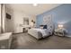 Stylishly decorated bedroom with a soft color palette, work station, and ample natural light at 16392 Grand Cypress Dr, Noblesville, IN 46060