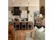 Gourmet kitchen featuring a stylish island with seating and custom pendant lighting at 16392 Grand Cypress Dr, Noblesville, IN 46060