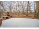 Spacious backyard patio with a brick outdoor kitchen area is perfect for entertaining at 208 Northshore Blvd, Anderson, IN 46011