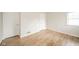 Inviting bedroom boasts wood floors, a window, and two large closets at 208 Northshore Blvd, Anderson, IN 46011