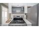 Modern kitchen featuring stainless steel appliances at 208 Northshore Blvd, Anderson, IN 46011