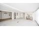 Bright, open living room with tiled flooring and lots of natural light throughout at 208 Northshore Blvd, Anderson, IN 46011