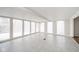 Sunlit room with large windows and tile flooring, perfect for relaxation at 208 Northshore Blvd, Anderson, IN 46011
