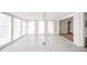 Bright, spacious sunroom with tile floors and large windows, offering versatile living space at 208 Northshore Blvd, Anderson, IN 46011
