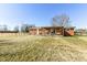 View of the backyard and patio area in this single Gathering home at 2351 N Raceway Rd, Indianapolis, IN 46234