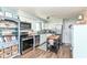 Modern kitchen featuring stainless steel appliances and plenty of counter space at 2351 N Raceway Rd, Indianapolis, IN 46234