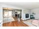Open-concept living room seamlessly connects to the dining area and modern kitchen at 2351 N Raceway Rd, Indianapolis, IN 46234