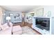Bright and airy living room with stylish furniture and seamless flow into other living spaces at 2351 N Raceway Rd, Indianapolis, IN 46234