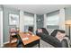 Home office featuring a desk, couch, and bright natural light at 2351 N Raceway Rd, Indianapolis, IN 46234