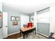 Home office setup with ample natural light and a modern desk at 2351 N Raceway Rd, Indianapolis, IN 46234