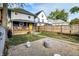 A well-maintained backyard featuring a stone area and green lawn at 3145 N New Jersey St, Indianapolis, IN 46205