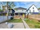 Inviting backyard with a patio, a well-manicured lawn, and mature trees at 3145 N New Jersey St, Indianapolis, IN 46205