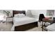 Comfortable bedroom featuring a bed, nightstand, and a dedicated workspace at 3145 N New Jersey St, Indianapolis, IN 46205