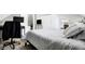 A cozy bedroom featuring neutral tones and a comfortable bed at 3145 N New Jersey St, Indianapolis, IN 46205