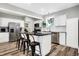 Well-appointed kitchen featuring stainless steel appliances, white cabinets, and a central island at 3145 N New Jersey St, Indianapolis, IN 46205