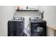 Well-equipped laundry room with modern gray front-load washer and dryer units at 3145 N New Jersey St, Indianapolis, IN 46205