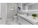 Contemporary bathroom featuring modern vanity, sleek fixtures, and elegant tile at 44 Kessler Blvd W Dr, Indianapolis, IN 46208