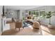 Sunlit living room features a large window, comfortable seating, and modern decorative elements at 44 Kessler Blvd W Dr, Indianapolis, IN 46208