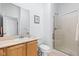 Bathroom featuring a shower and vanity with a marble countertop at 450 E Ohio St # Apt 118, Indianapolis, IN 46204