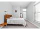Light and airy bedroom with walkout to the exterior at 450 E Ohio St # Apt 118, Indianapolis, IN 46204