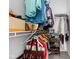 Walk-in closet featuring an organized system for clothes and accessories at 450 E Ohio St # Apt 118, Indianapolis, IN 46204