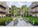 Outdoor courtyard featuring seating and landscaping at 450 E Ohio St # Apt 118, Indianapolis, IN 46204