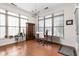 Dining room featuring lots of natural light, a modern light fixture, and a wooden cabinet at 450 E Ohio St # Apt 118, Indianapolis, IN 46204