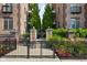 Gated entrance to an apartment complex with beautiful landscaping at 450 E Ohio St # Apt 118, Indianapolis, IN 46204