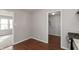 Hallway leading into kitchen, laundry and other room at 518 E College Ave, Brownsburg, IN 46112