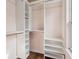 Walk-in closet with custom shelving and storage system at 5546 W Vistaview Trl, McCordsville, IN 46055